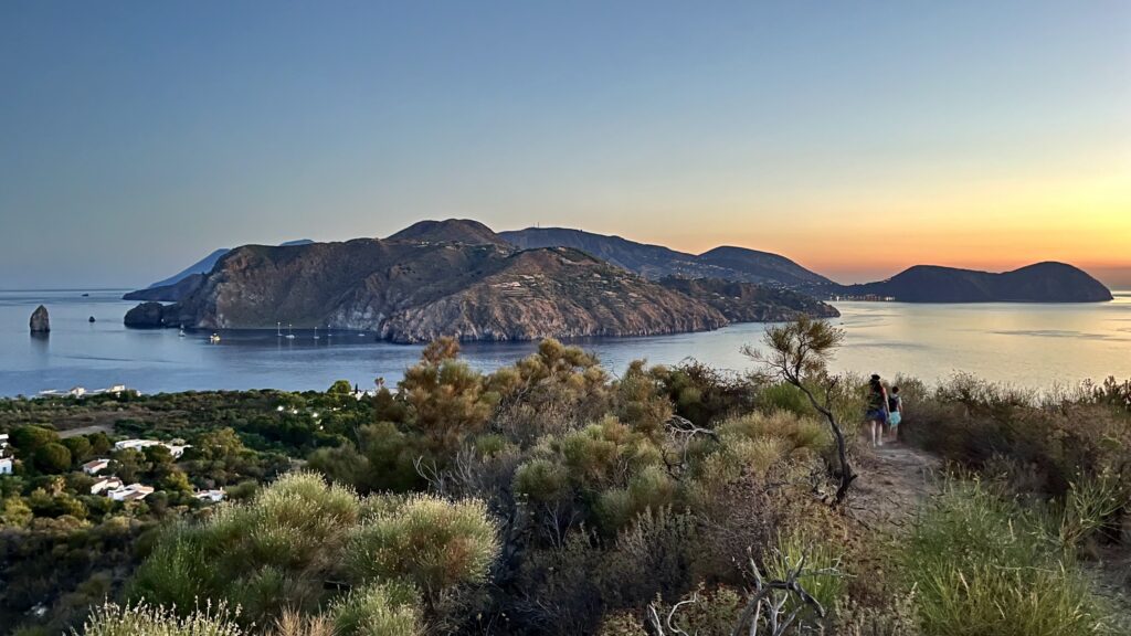isla de vulcano, una de las islas eolias, vista desde otra isla, a la hora del atardecer - weroad